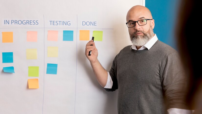 bearded-man-presenting-business-method_23-2148513815.jpg