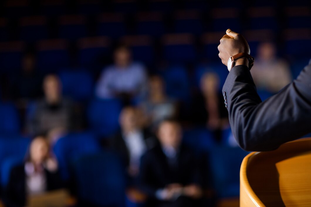 male-business-executive-giving-speech_107420-63809.jpg
